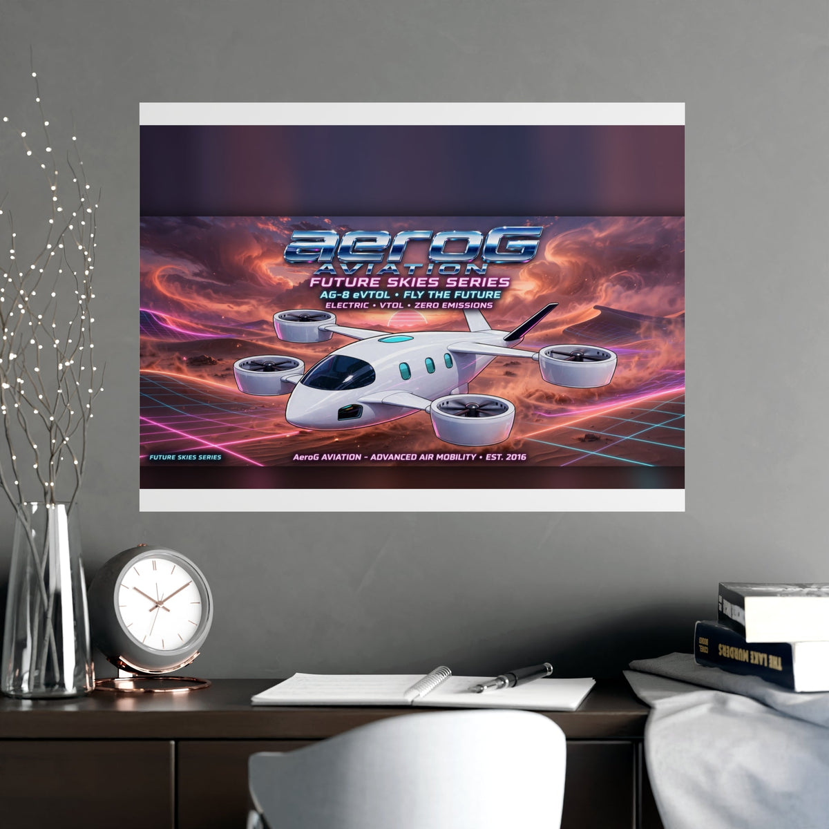 Arcade style aviation poster: Desert Storm — lifestyle mockup of the framed poster on a dark gray wall above a wooden desk with a round clock, open notebook, pen, books, a vase of decorative branches, and a white chair, by aeroG Aviation