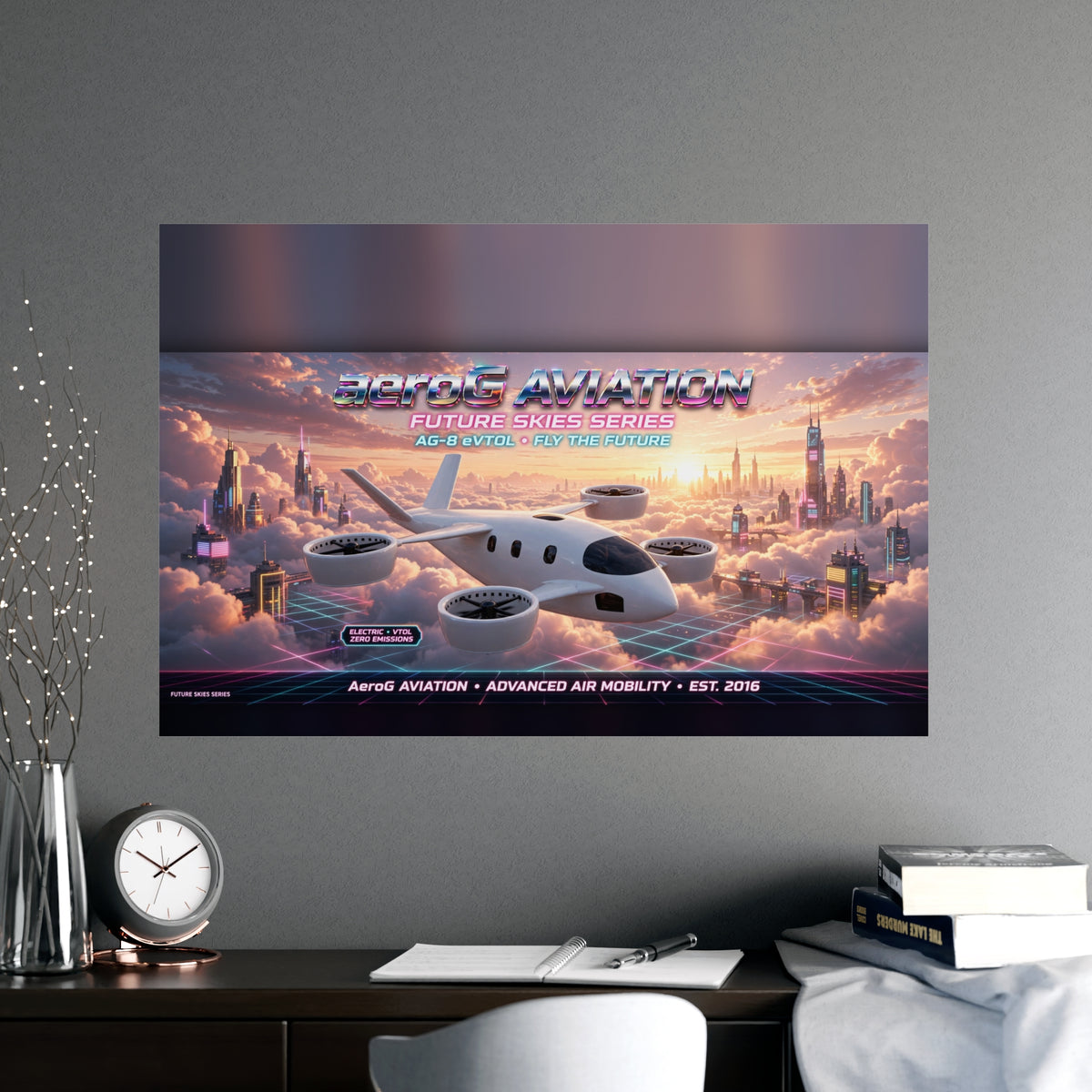Arcade style aviation poster: Cloud City — lifestyle mockup of the framed poster on a gray wall above a dark wooden desk with a clock, open notebook, pen, stacked books, and a vase of decorative branches, by aeroG Aviation